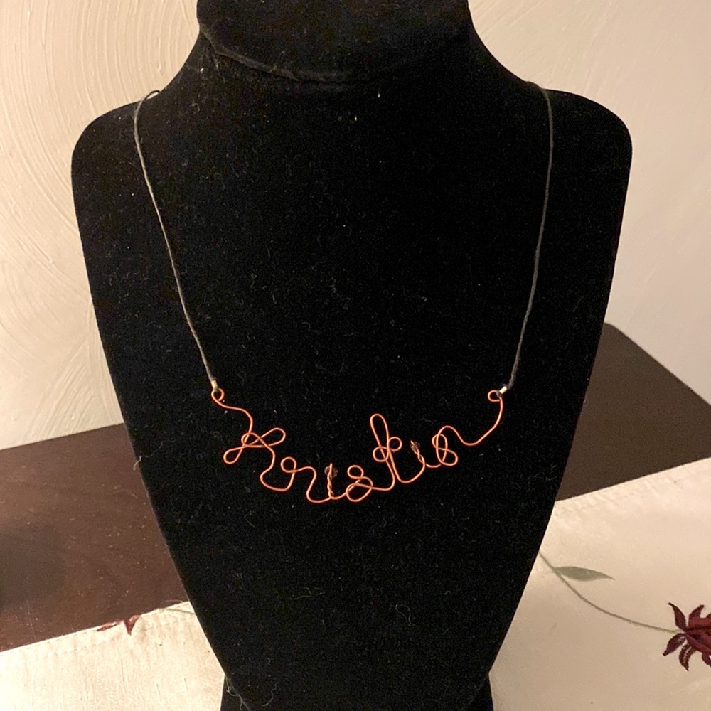 10” Length Rope Necklace with clasp, Orange metal twisted to spell out Kristin